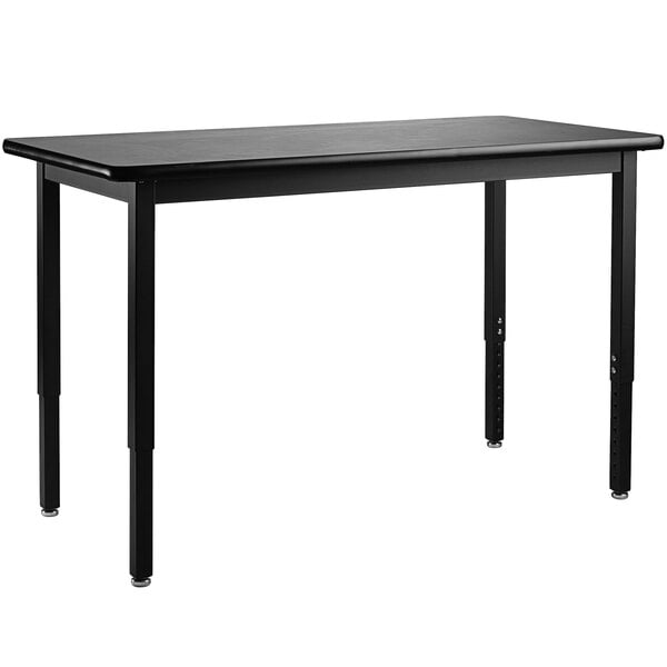 A black rectangular National Public Seating science lab table with legs.