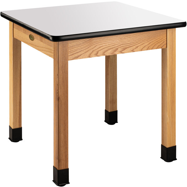 A white rectangular table with a whiteboard top.