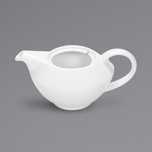 A Bauscher bright white porcelain teapot with a handle.