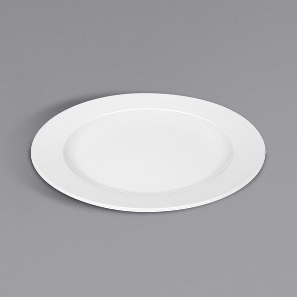 A Bauscher bright white porcelain plate with a wide rim.