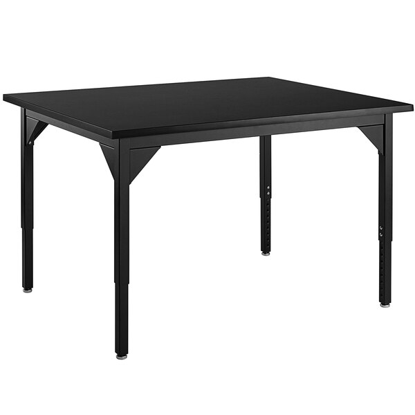 A black rectangular National Public Seating science lab table with legs.