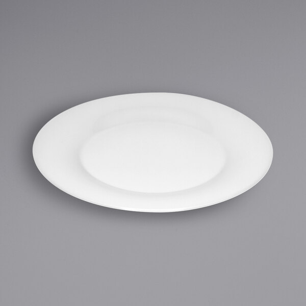 A Bauscher bright white porcelain plate with a wide rim.