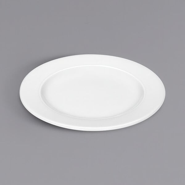 A Bauscher bright white porcelain plate with a wide rim.