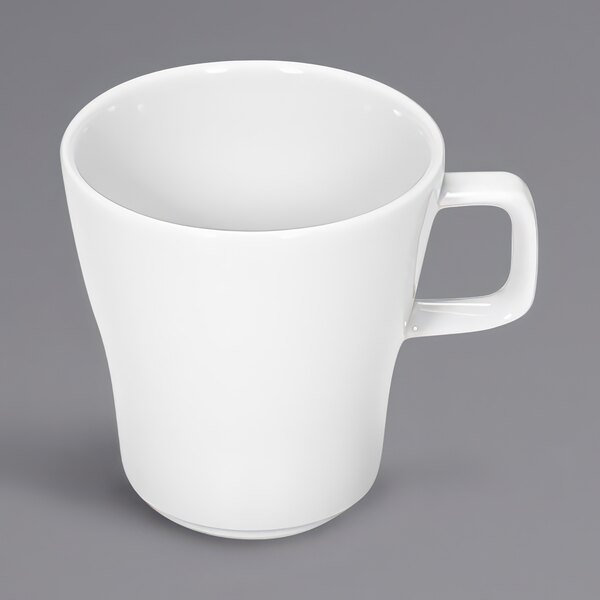 A Bauscher by BauscherHepp white tall cup with a handle.