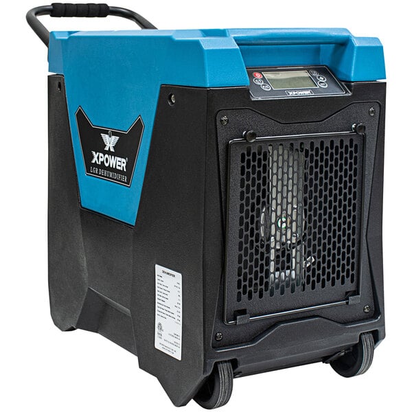 A blue and black XPOWER commercial dehumidifier with wheels and a handle.