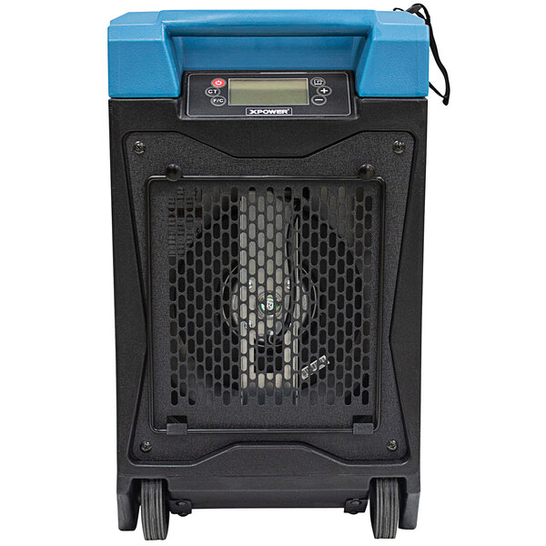 A black and blue XPOWER commercial dehumidifier with a metal grill.