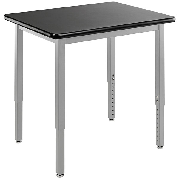 A black National Public Seating utility table with a metal base and legs.