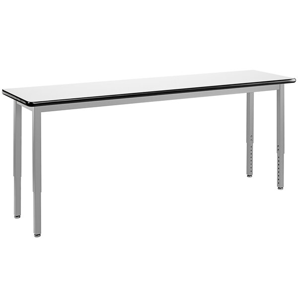 a white rectangular table with black trim