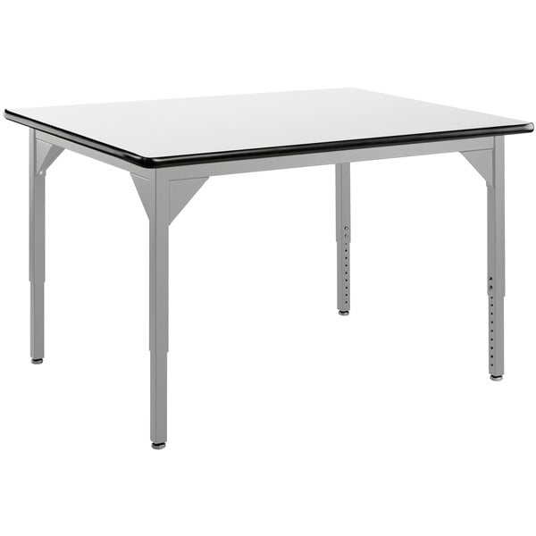 A white National Public Seating utility table with a black edge and legs and a whiteboard top.
