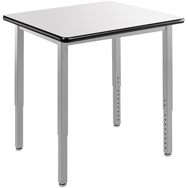 a white square table with black edge