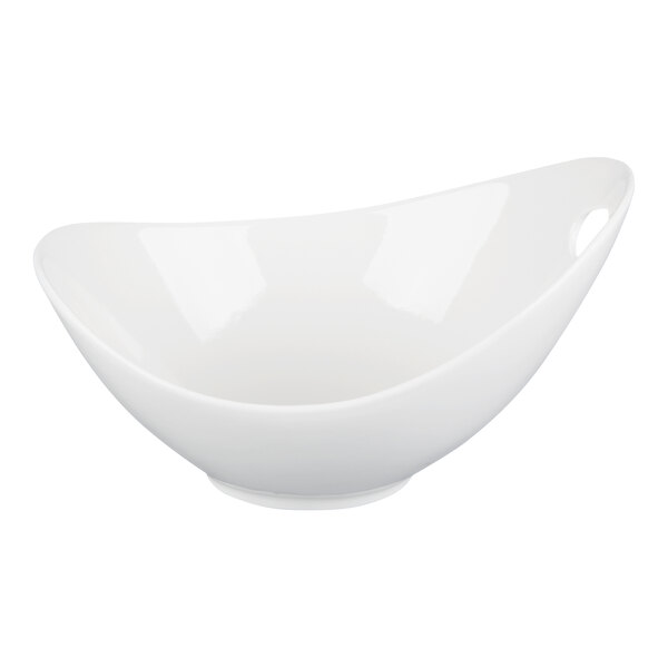A white porcelain serving bowl with a modern design and a cut-out handle.