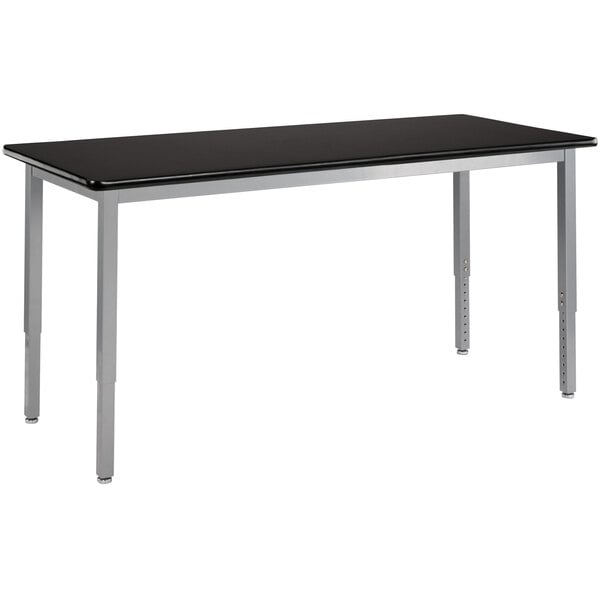 A gray National Public Seating utility table with a black rectangular top and silver legs.