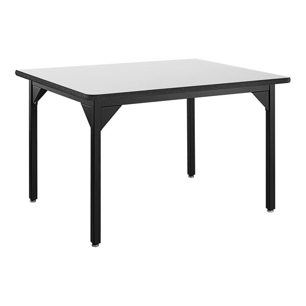 A black rectangular National Public Seating utility table with a white high-pressure laminate top.
