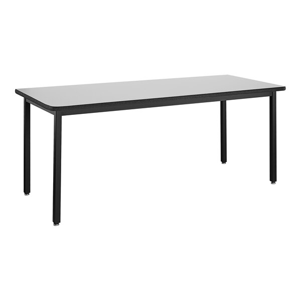 A black rectangular National Public Seating utility table with black legs.