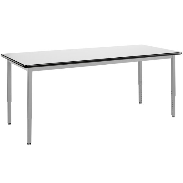 A white rectangular table with black trim.