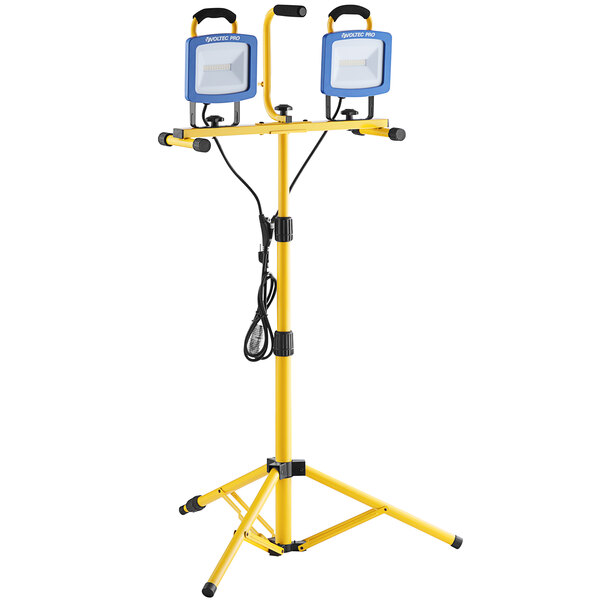 A yellow Voltec work light stand with two lamps.