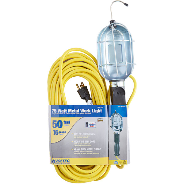 A yellow metal work light with a yellow cord.