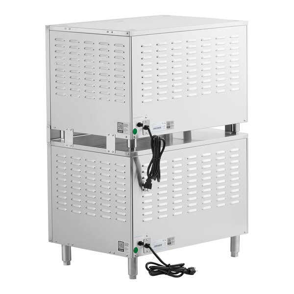 A stainless steel quadruple deck countertop pizza and bakery oven with ventilation slots and power cords.
