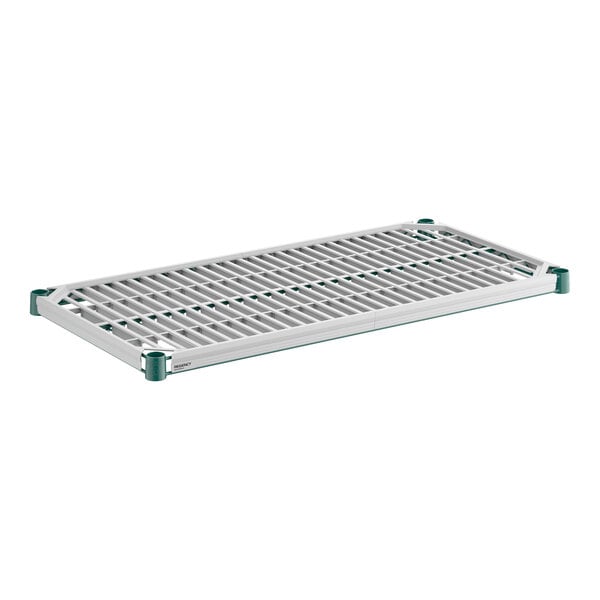 A rectangular metal shelf with a grid pattern and green corner accents, featuring a fitted polymer mat underneath.