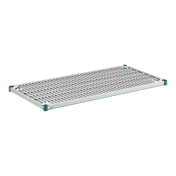 A rectangular metal wire shelf with a green frame and a grid-like polymer mat insert, featuring green corner caps.