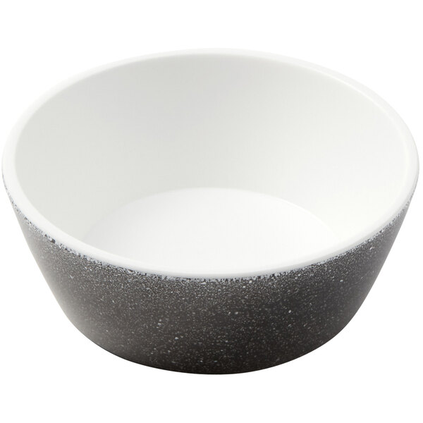 A close-up of an American Metalcraft white and black speckled melamine bowl.