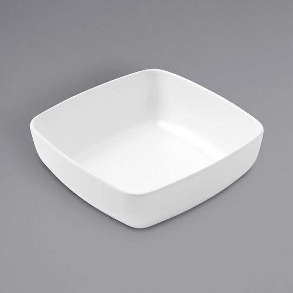 a white square bowl on a gray background