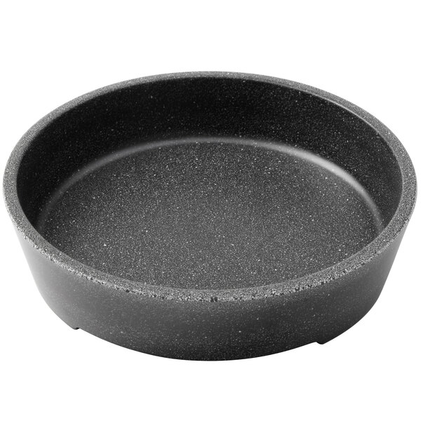 a black round pan with speckled surface