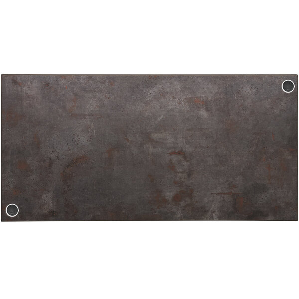 A rectangular grey metal BFM Seating table top with wireless chargers.