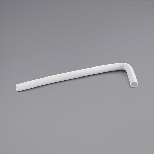 A white plastic tube on a gray surface.