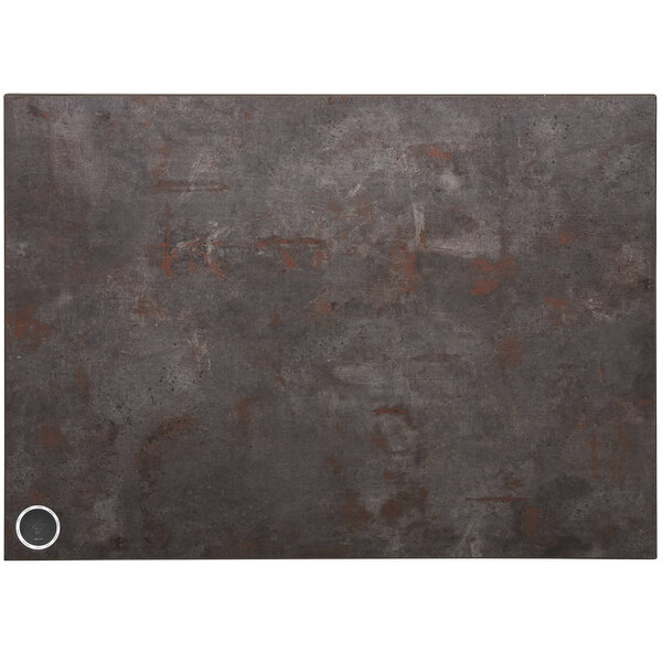 A BFM Seating Relic rustic copper rectangular table top with a metal circle.