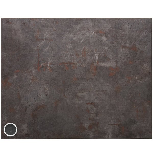 A rectangular rustic copper table top with a black circle containing a white lightning bolt.