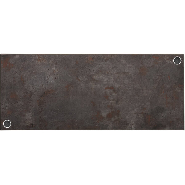 A rectangular BFM Seating Relic melamine table top in a grey rustic copper finish with two wireless chargers.