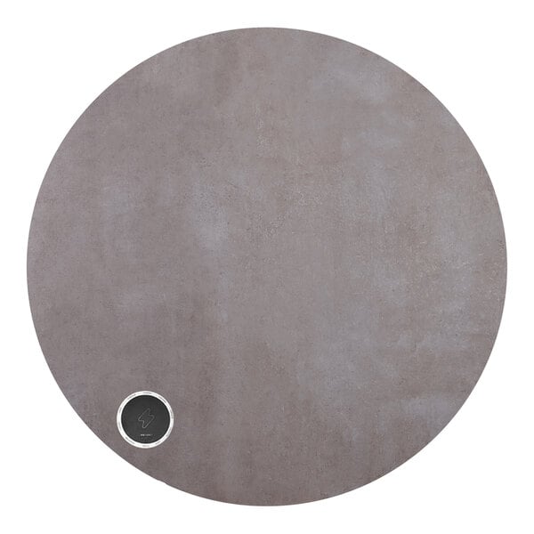 A circular grey BFM Seating tabletop with a round black circle in the middle.