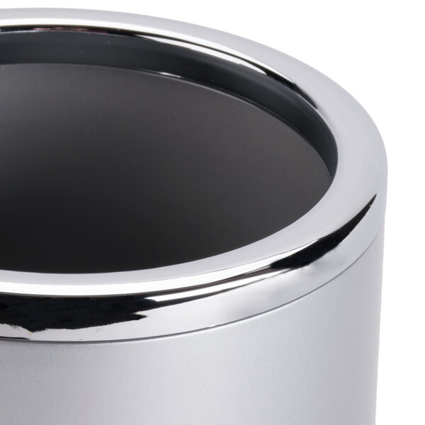 An American Metalcraft silver acrylic wine cooler on a table.