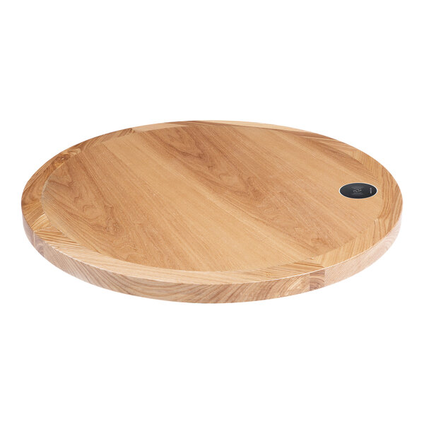 A BFM Seating natural ash veneer wood table top with a circular edge.