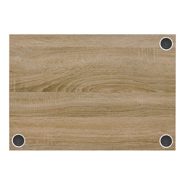 A wood grained BFM Seating rectangular table top with a grainy pattern.