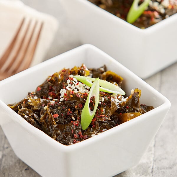 A bowl of Atlantic Sea Farms Seaweed Salad with green vegetables and sesame seeds.