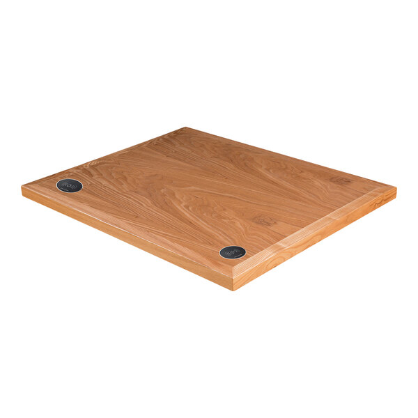 A BFM Seating rectangular wood table top with 2 wireless chargers and 2 circular holes.