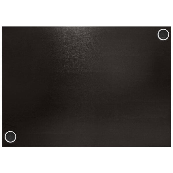 A black rectangular tabletop with two black circles.