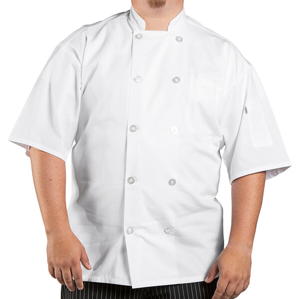 A man wearing a white Uncommon Chef Delray Pro Vent chef coat with mesh back.