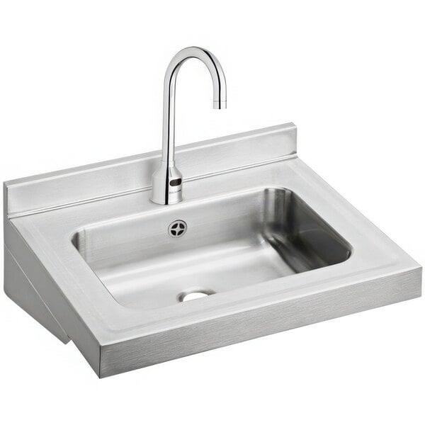 A Zurn stainless steel wall hung lavatory sink with faucet and drain.