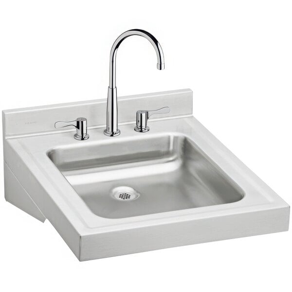 A Zurn stainless steel wall hung sink with faucet.