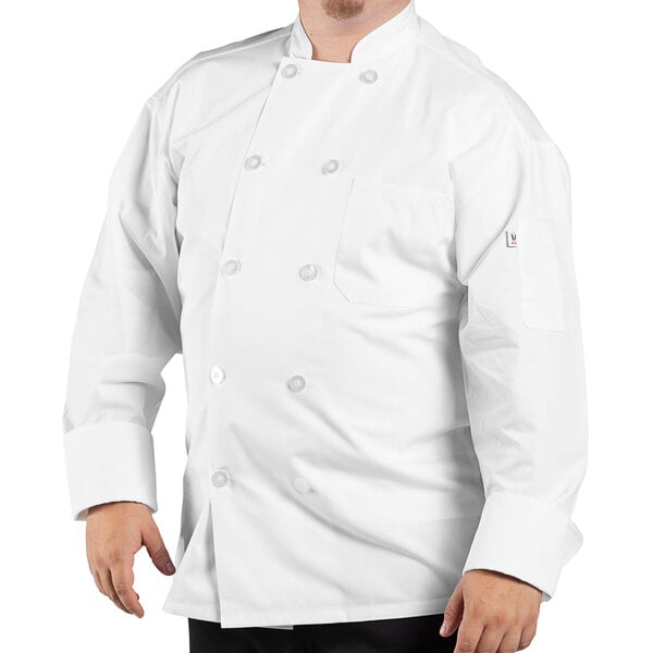 A man wearing a white Uncommon Chef long sleeve chef coat.