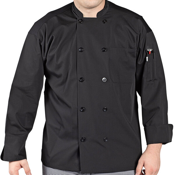 A man wearing a black Uncommon Chef long sleeve chef coat with a mesh back.