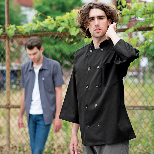 a man wearing a grey shirt