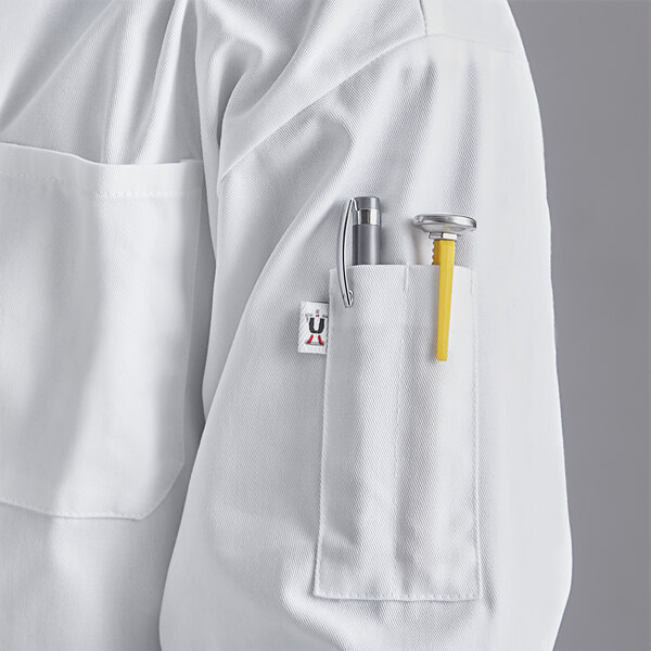 a person wearing a white coat with a pen and a hammer in the pocket