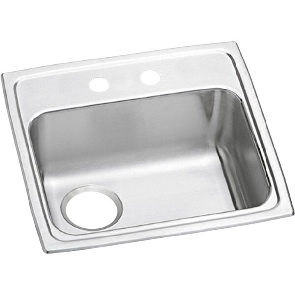 A stainless steel Elkay sink with two faucet holes.