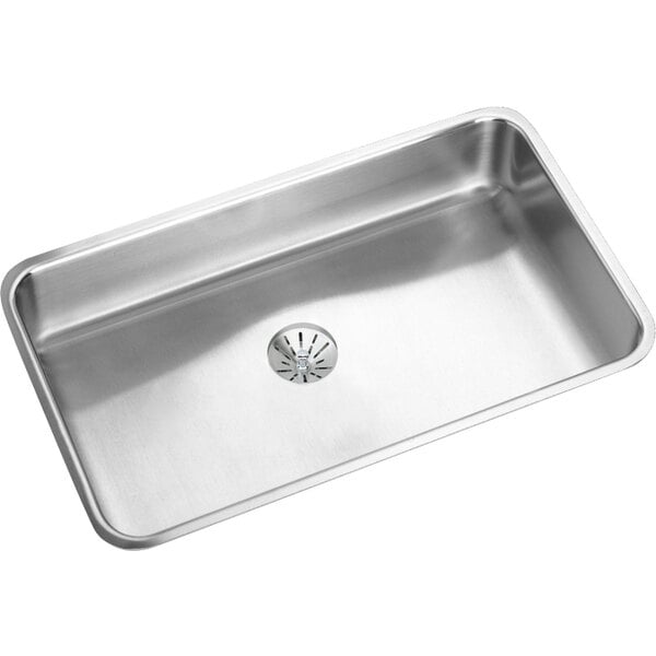 A close up of the Perfect Drain in an Elkay Lusterstone single bowl undermount sink.