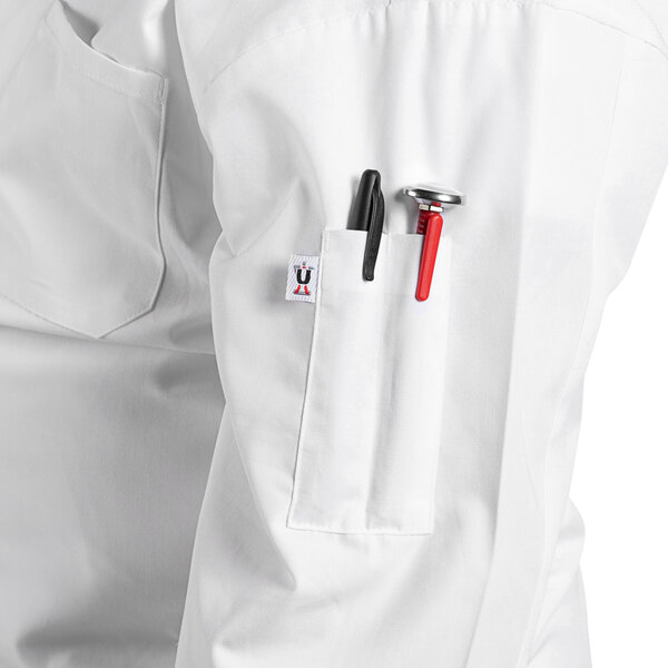 A Uncommon Chef white long sleeve chef coat with a mesh back, pocket, and pen holder.