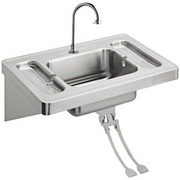 A Zurn stainless steel wall hung lavatory sink with a faucet and foot pedals.